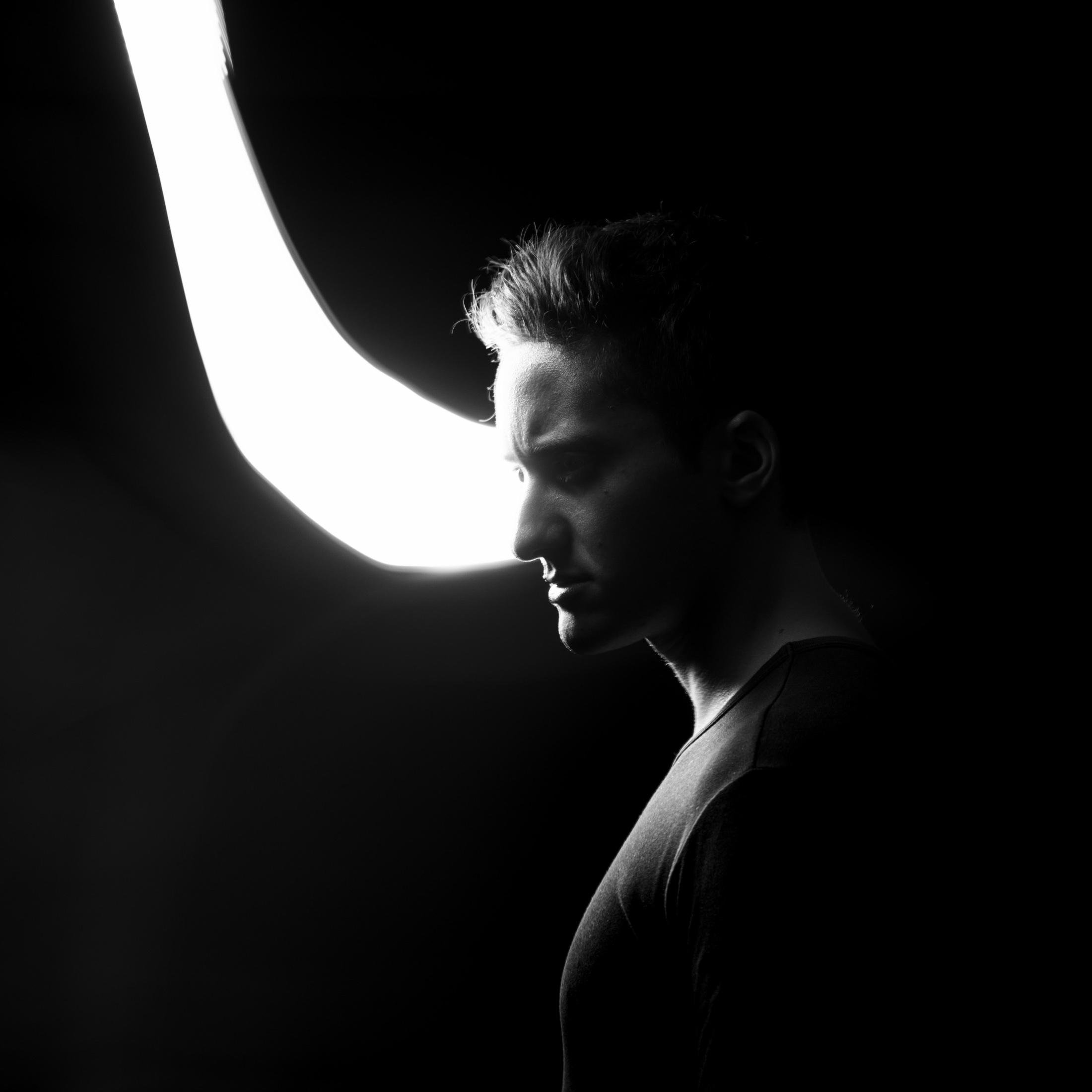 Daniel Pando working at a wall of visual references